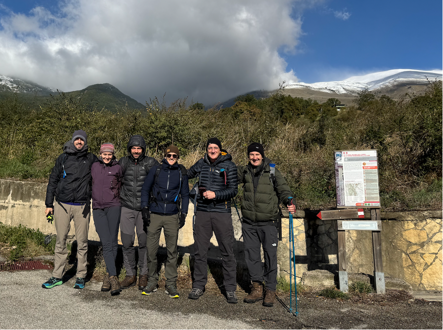 Robert Drew in black and white holding an old video camera
